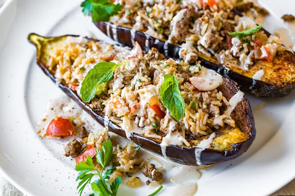 Stuffed Eggplant with Warm-Spiced Beef and Garlic Tahini Sauce
