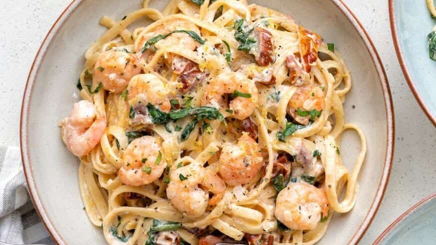 Creamy Tuscan Shrimp Linguine with Sun-Dried Tomatoes and Spinach