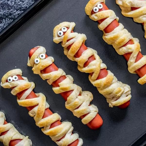 Mummy Hot Dogs with Golden Crescent Roll Bandages