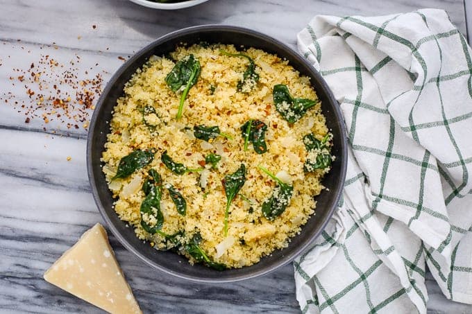 Parmesan Spinach Couscous with Tender Greens and Salty Cheese